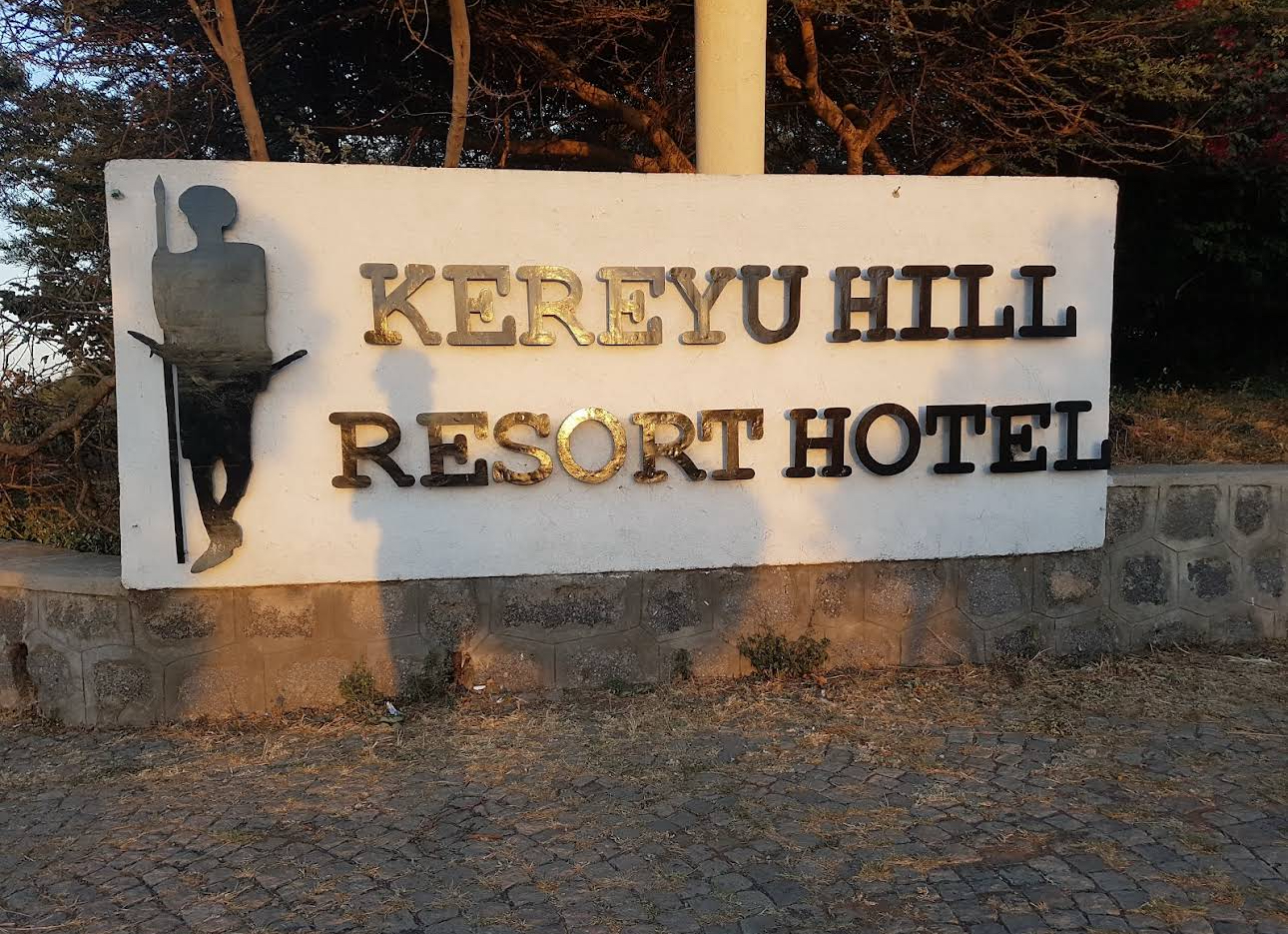 Kereyu Hill Resort Hotel Logo and Name on Wall